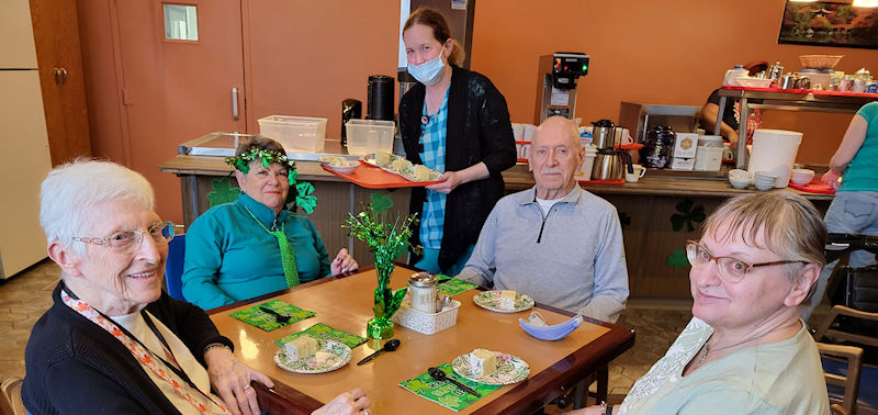 Residential Home residents enjoy a card game